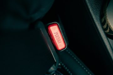 a close up shot of a seatbelt buckle